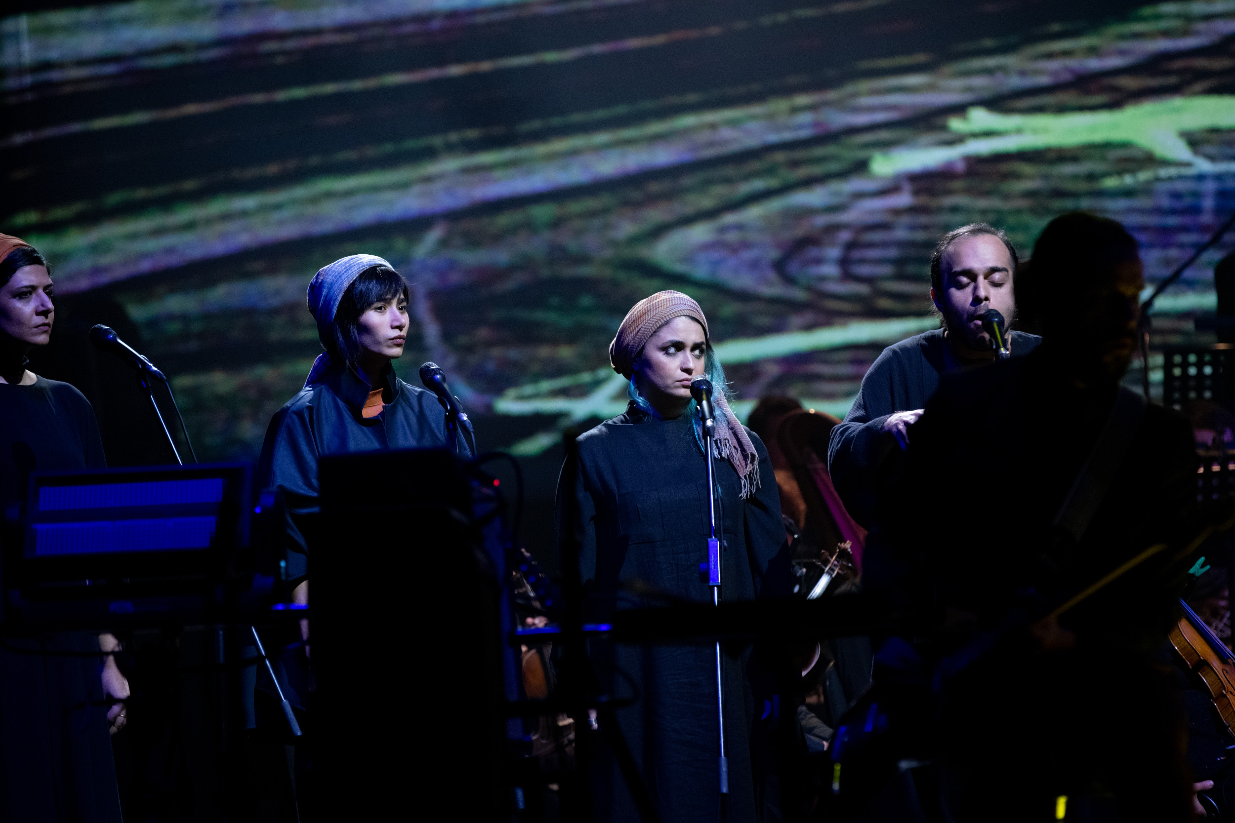 Screenshot from the performance of Alamut by Laibach in Ljubljana, Slovenia. This image depicts the Iranian vocal ensemble.